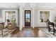Elegant entryway with hardwood floors, high ceilings, and natural light at 3739 Tielman St, Snellville, GA 30078