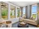 Relaxing sunroom with views of the backyard and golf course at 3739 Tielman St, Snellville, GA 30078