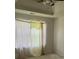 Bedroom with window and ceiling fan at 2112 Bradford Pear Se Cir, Conyers, GA 30013