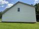 House exterior with white vinyl siding at 2112 Bradford Pear Se Cir, Conyers, GA 30013
