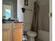 Bathroom with tub, toilet and vanity at 2112 Bradford Pear Se Cir, Conyers, GA 30013