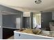 Renovation kitchen with gray walls and island at 2112 Bradford Pear Se Cir, Conyers, GA 30013