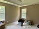 Large bedroom with two windows at 2112 Bradford Pear Se Cir, Conyers, GA 30013