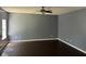 Spacious living room with dark hardwood floors at 2112 Bradford Pear Se Cir, Conyers, GA 30013
