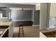Kitchen with dark wood cabinets and an island at 2112 Bradford Pear Se Cir, Conyers, GA 30013
