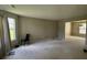 Spacious living room with neutral walls and carpeted floors at 2112 Bradford Pear Se Cir, Conyers, GA 30013