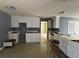 Unfinished white kitchen with gray walls at 2112 Bradford Pear Se Cir, Conyers, GA 30013