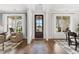 Elegant entryway showcasing hardwood floors and natural light at 3869 Tielman St, Snellville, GA 30078