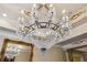 Large crystal chandelier in formal dining room at 1197 Lynmoor Ne Dr, Brookhaven, GA 30319