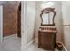 Elegant powder room with ornate vanity and marble countertop at 1197 Lynmoor Ne Dr, Brookhaven, GA 30319