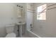 Simple bathroom featuring a tub, sink, and updated light fixture at 1143 Briarcliff Rd, Atlanta, GA 30306