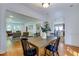 Bright dining room with hardwood floors and view into living room at 1143 Briarcliff Rd, Atlanta, GA 30306