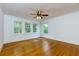 Spacious bedroom with hardwood floors and large windows at 1143 Briarcliff Rd, Atlanta, GA 30306