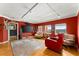 Living area with large TV, comfortable seating, and hardwood floors at 3435 Kingsboro Ne Rd # 1201, Atlanta, GA 30326