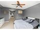 Bright bedroom with king-size bed and access to bathroom at 3435 Kingsboro Ne Rd # 1201, Atlanta, GA 30326