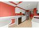 White kitchen with curved island and stainless steel appliances at 3435 Kingsboro Ne Rd # 1201, Atlanta, GA 30326
