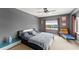 Spacious bedroom with a ceiling fan and large windows at 3435 Kingsboro Ne Rd # 1201, Atlanta, GA 30326