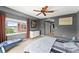 Spacious bedroom with large window, ceiling fan, and ample closet space at 3435 Kingsboro Ne Rd # 1201, Atlanta, GA 30326