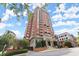 Impressive high-rise building with classic design and tree-lined street at 3435 Kingsboro Ne Rd # 1201, Atlanta, GA 30326