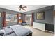 Bright bedroom with city views, ceiling fan and dresser at 3435 Kingsboro Ne Rd # 1201, Atlanta, GA 30326