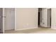 Spacious bedroom with doors to other rooms at 6626 Dorian Dr, Union City, GA 30291