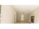 Spacious living room features a stone fireplace and large window at 6626 Dorian Dr, Union City, GA 30291