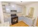 Modern kitchen with gray cabinets and granite countertops at 4726 Carson Pass, Atlanta, GA 30331