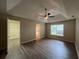 Large main bedroom with ceiling fan and walk-in closet at 3510 Tiffany Se Dr, Conyers, GA 30013