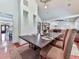 Dining room table set for dinner beneath a large chandelier at 1012 Jubilee Way, Powder Springs, GA 30127