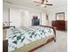 Main bedroom with a king-size bed and plenty of natural light at 37 Ridgeline Nw Way, Cartersville, GA 30121