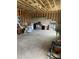 Unfinished basement with concrete floor and various storage items at 37 Ridgeline Nw Way, Cartersville, GA 30121