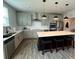 Open kitchen with large island, stainless steel appliances, and pendant lighting at 37 Ridgeline Nw Way, Cartersville, GA 30121
