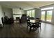 Spacious living room with fireplace, dining area, and access to deck with scenic views at 37 Ridgeline Nw Way, Cartersville, GA 30121