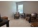 Cozy bedroom with two armchairs, window, and neutral color scheme at 37 Ridgeline Nw Way, Cartersville, GA 30121