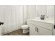 Bathroom with white vanity, shower, and toilet at 37 Ridgeline Nw Way, Cartersville, GA 30121