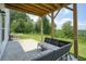 Covered patio with seating and hilltop views at 37 Ridgeline Nw Way, Cartersville, GA 30121