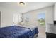 Comfortable bedroom with a queen bed and two windows with blinds at 37 Ridgeline Nw Way, Cartersville, GA 30121