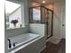 Bathroom with soaking tub and walk-in shower at 37 Ridgeline Nw Way, Cartersville, GA 30121