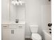 Clean bathroom with white vanity, black matte fixtures, and a shower/tub combo at 37 Ridgeline Nw Way, Cartersville, GA 30121