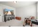 Relaxing sitting area with large TV, comfy armchair and console table at 37 Ridgeline Nw Way, Cartersville, GA 30121