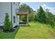 White two-story house with deck and hilltop view at 37 Ridgeline Nw Way, Cartersville, GA 30121