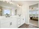 Elegant bathroom with double vanity, walk-in shower, and bedroom view at 37 Ridgeline Nw Way, Cartersville, GA 30121