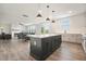 Open concept kitchen with island and view into living room at 37 Ridgeline Nw Way, Cartersville, GA 30121
