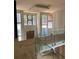 Bright landing with glass railings and views of the lower level at 2147 Briarwillow Ne Dr, Atlanta, GA 30345
