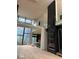 Two-story great room with floor to ceiling windows and marble fireplace at 2147 Briarwillow Ne Dr, Atlanta, GA 30345