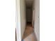 Long hallway with light walls and flooring in the process of being installed at 2147 Briarwillow Ne Dr, Atlanta, GA 30345
