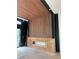 Modern linear fireplace with wood feature wall at 2147 Briarwillow Ne Dr, Atlanta, GA 30345