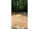 Large backyard with trees and a cleared area at 2147 Briarwillow Ne Dr, Atlanta, GA 30345