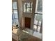 Bright entryway with tall windows and a wood door at 2147 Briarwillow Ne Dr, Atlanta, GA 30345