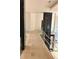 Modern glass-railed hallway with under-construction flooring at 2147 Briarwillow Ne Dr, Atlanta, GA 30345
